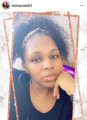 A selfie-style portrait with silver hoop earrings and a sparkly headband.